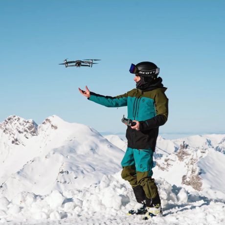 Baptiste Mabillard piloting a drone in the Swiss Alps